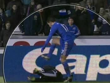 Eden Hazard Kicks a Ball Boy