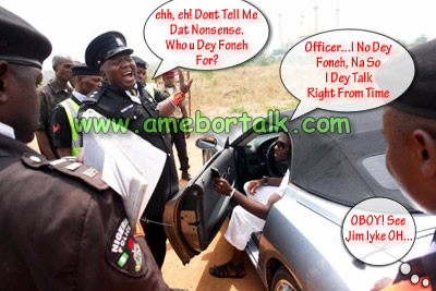 Jim Iyke With Police Officer